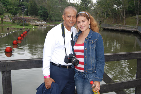 A photo of a client with one of the alluring Latin women