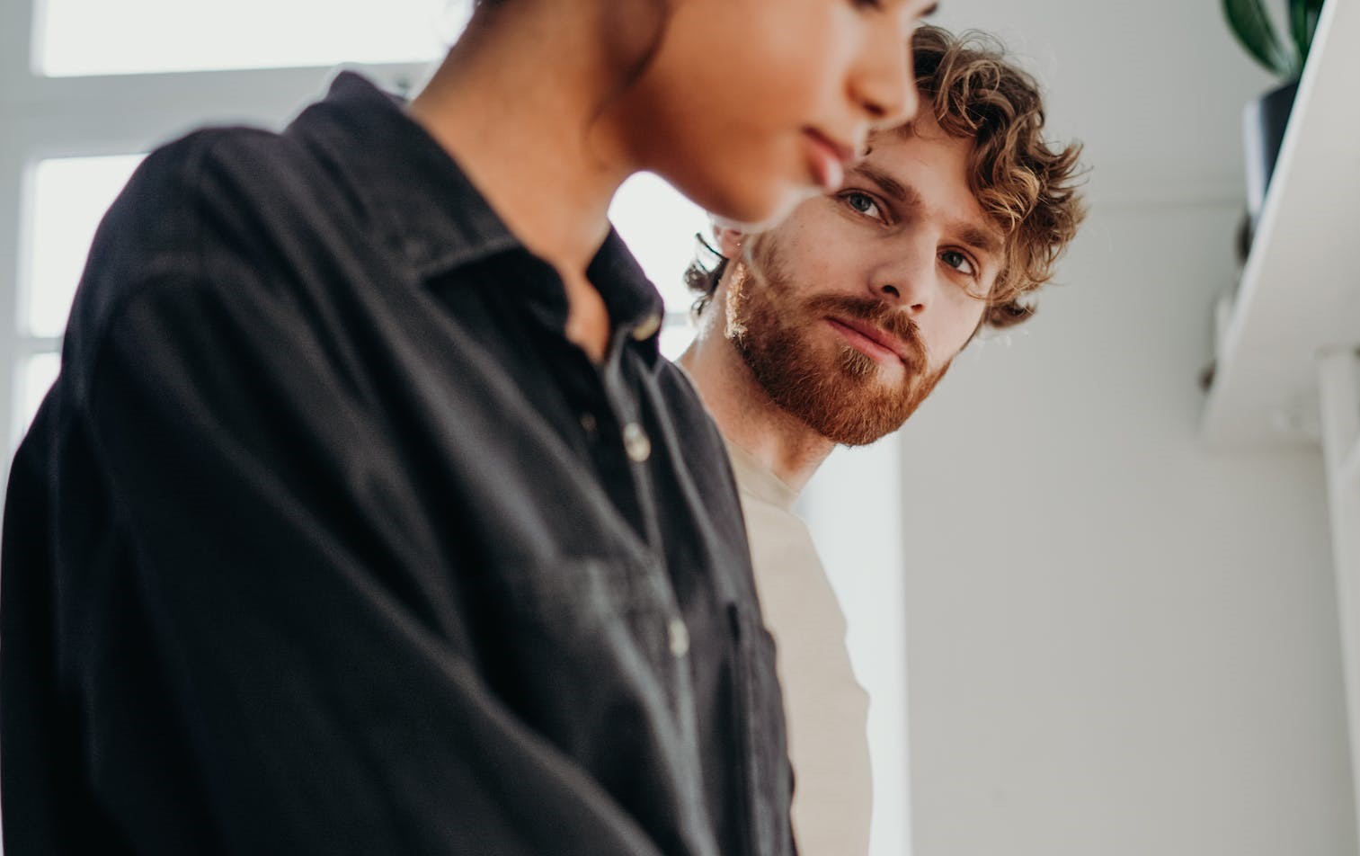 A man looking at a woman, hungry for love.